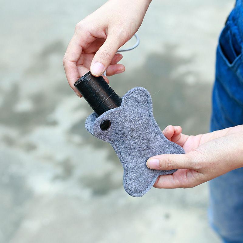 Pet Life ®Fleece Bone Shaped Travel Waste Bag Dispenser with 2 Rolls